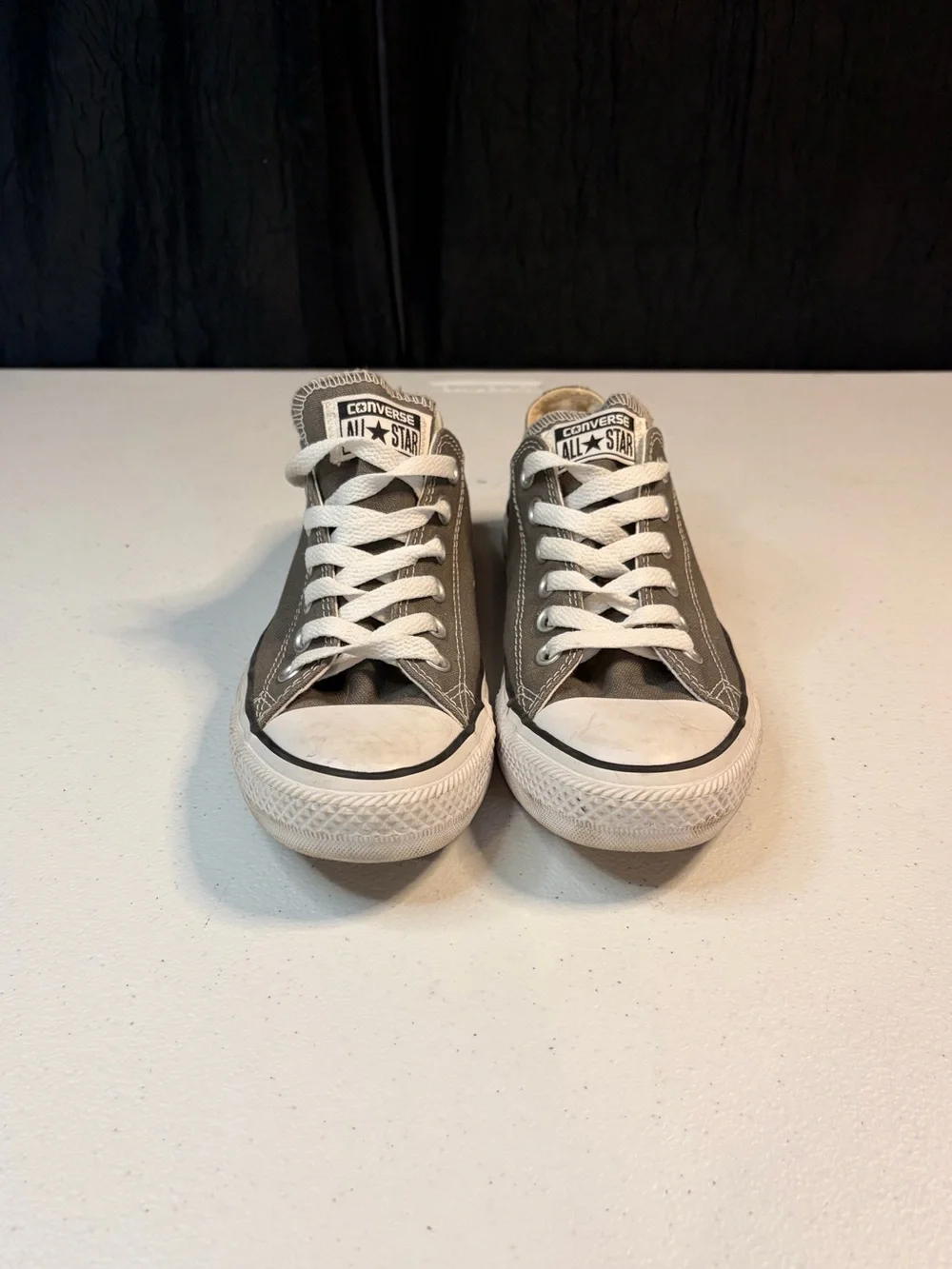 Converse charcoal display